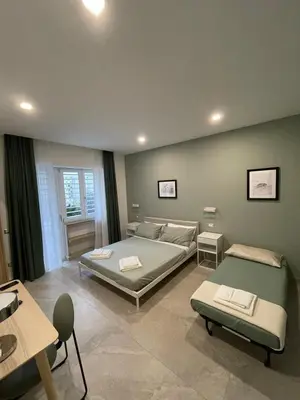 Letto o letti in una camera di Domus Cervantes Apartment