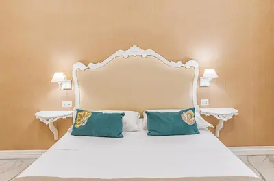 Letto o letti in una camera di Gentile Suite & Spa Vomero