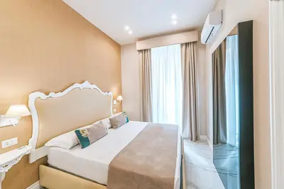 Letto o letti in una camera di Gentile Suite & Spa Vomero