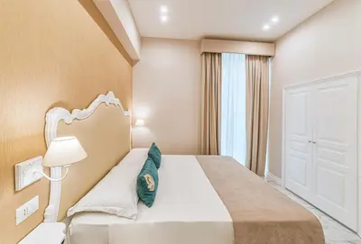 Letto o letti in una camera di Gentile Suite & Spa Vomero
