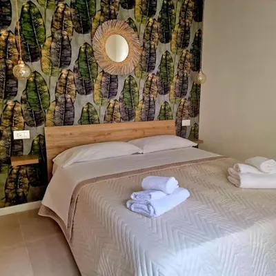 Letto o letti in una camera di Piccolo appartamento di charme