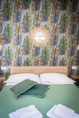 Letto o letti in una camera di Piccolo appartamento di charme