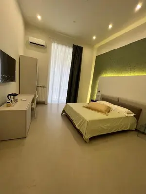 Letto o letti in una camera di Dimora Chiaia