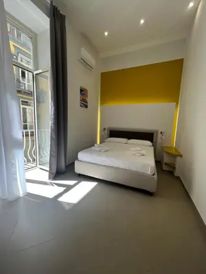 Letto o letti in una camera di Dimora Chiaia