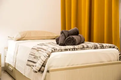 Letto o letti in una camera di La casa di Ari