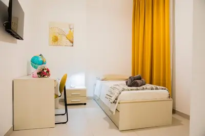 Letto o letti in una camera di La casa di Ari