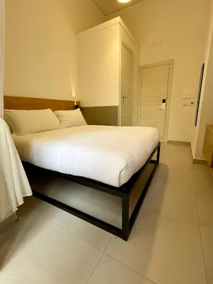Letto o letti in una camera di NaBaB-Napoli Bed And Breakfast