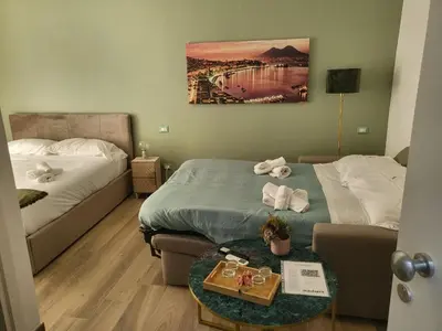 Letto o letti in una camera di San Severino Boutique Apartment