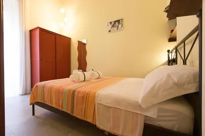 Letto o letti in una camera di La Fontana di Rua Catalana