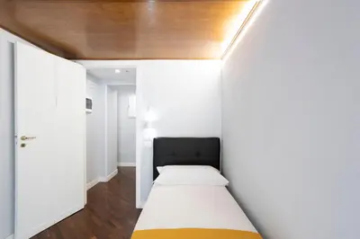 Letto o letti in una camera di La Chambre Duomo