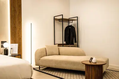 Letto o letti in una camera di MAMALU - Studios and Suites