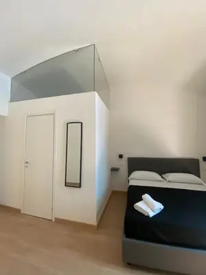 Letto o letti in una camera di Maison Dante