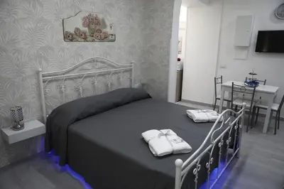 Letto o letti in una camera di HOUSE GIULIA