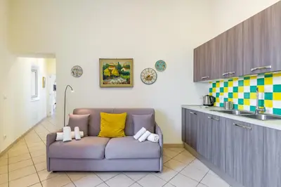Area soggiorno di Dream Terrace on the Gulf by Napoliapartments