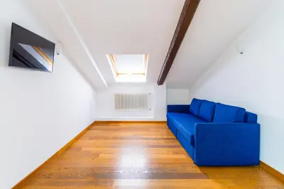 TV o dispositivi per l'intrattenimento presso Attico al Duomo by Napoliapartments