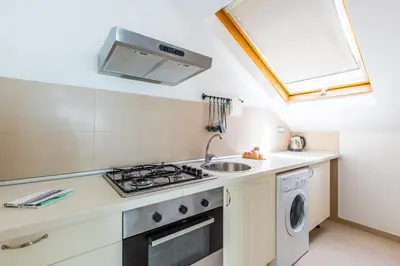 Cucina o angolo cottura di Attico al Duomo by Napoliapartments