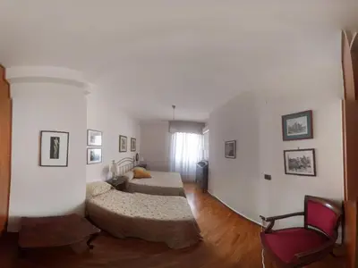 Letto o letti in una camera di Napoli Porta Di Mare