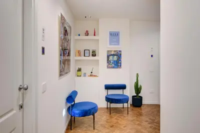 Area soggiorno di Well Suites - Piazza dei Martiri
