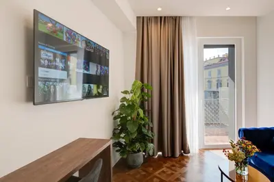 TV o dispositivi per l'intrattenimento presso Well Suites - Piazza dei Martiri