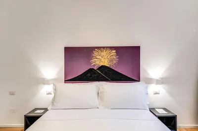 Letto o letti in una camera di La Corte Di Partenope Napoli