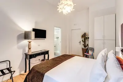 Letto o letti in una camera di La Corte Di Partenope Napoli