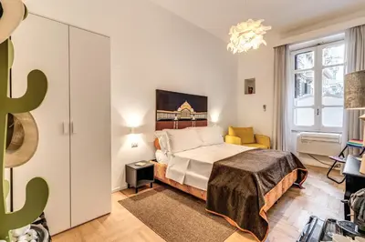Letto o letti in una camera di La Corte Di Partenope Napoli