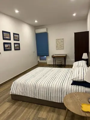Letto o letti in una camera di Casa Gaia A due passi dal Duomo