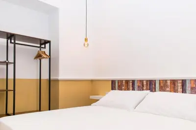 Letto o letti in una camera di La Sciantosa Quartieri Spagnoli