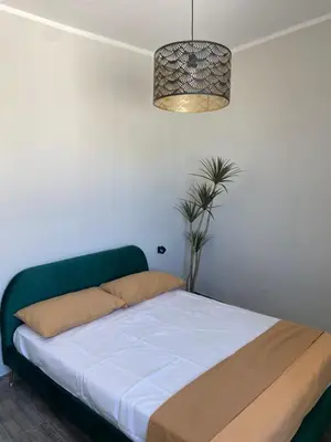 Letto o letti in una camera di Greta’s House - Napoli Centro