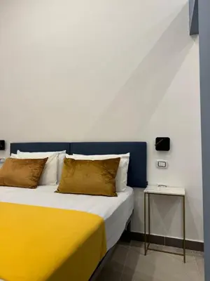 Letto o letti in una camera di Boutique Hotel Piazza Carità