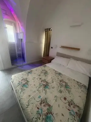Letto o letti in una camera di La dimora di Annalisa