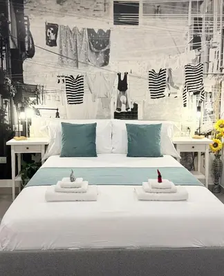 Letto o letti in una camera di Casa e Bottega 41 Apartment