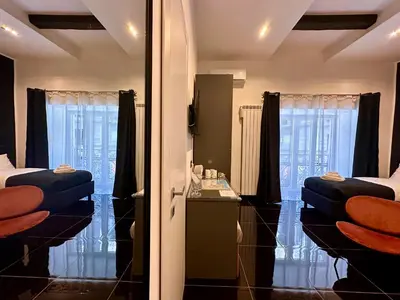 Area soggiorno di Elegance Rooms Spaccanapoli