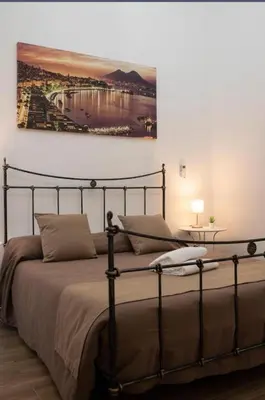Letto o letti in una camera di Spaccanapoli Rooms Duomo