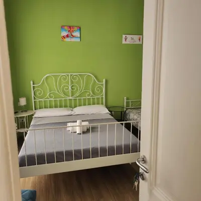 Letto o letti in una camera di Spaccanapoli Rooms Duomo
