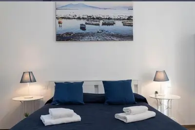 Letto o letti in una camera di Spaccanapoli Rooms Duomo