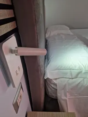 Letto o letti in una camera di WorldwideSuites