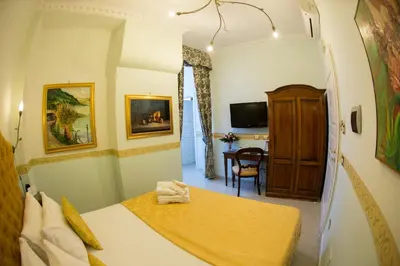 Letto o letti in una camera di B&B Art Suite Santa Brigida