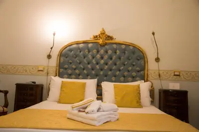 Letto o letti in una camera di B&B Art Suite Santa Brigida
