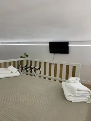 Letto o letti in una camera di MAGIUMA HOUSE