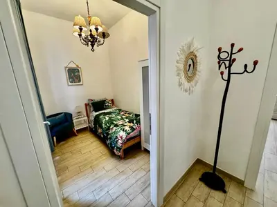 Letto o letti in una camera di La casa di Sarah aspetta voi