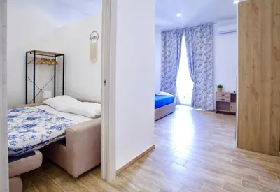 Letto o letti in una camera di Amabile casa vacanze