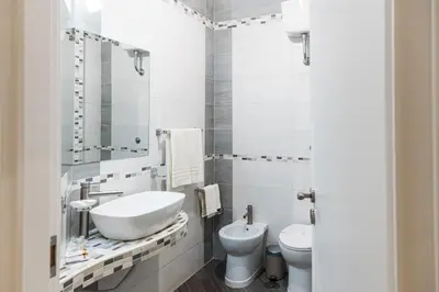 Bagno di LA MASCHERA DI PULCINELLA