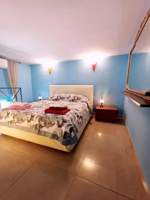 Letto o letti in una camera di GoldenCube Guest House