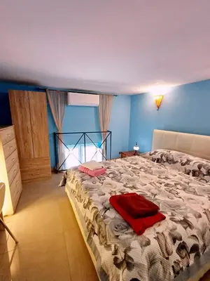 Letto o letti in una camera di GoldenCube Guest House