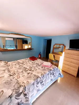 Letto o letti in una camera di GoldenCube Guest House