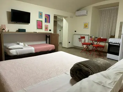 Letto o letti in una camera di MareLuna Guest House