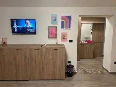 TV o dispositivi per l'intrattenimento presso MareLuna Guest House
