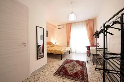 Letto o letti in una camera di Vomero Room