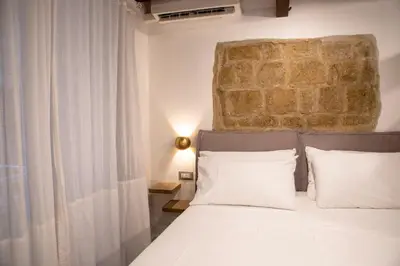 Letto o letti in una camera di Casa Vacanze Maritè Apartment